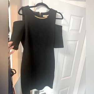 Cold shoulder, quilt textures Micheal Kors dress. Size medium. Black